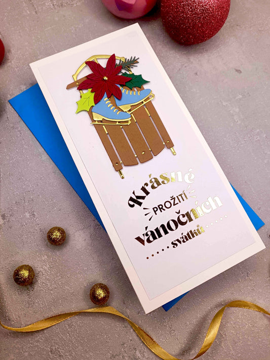 Vánoční přání se sáněmi a bruslemi