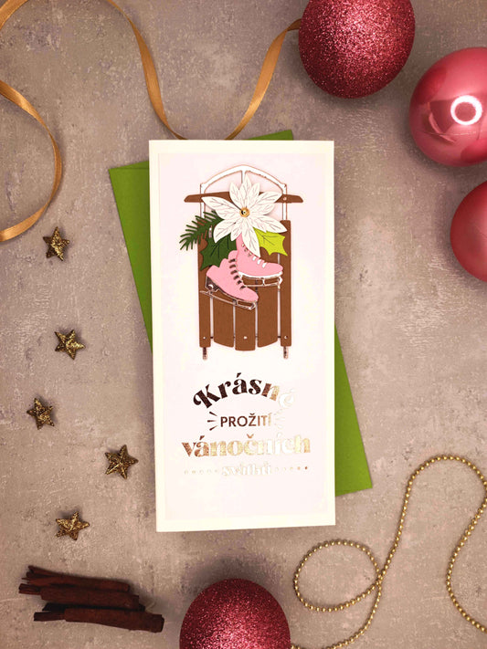 Vánoční přání se sáněmi a bruslemi