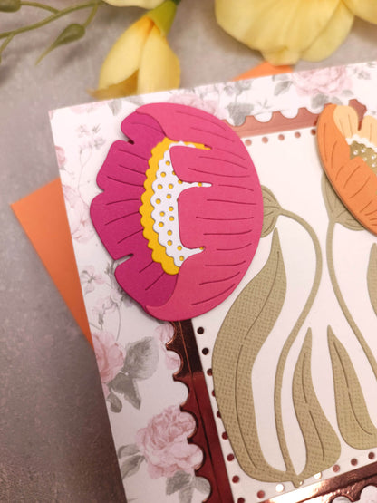 Květinové narozeninové přání se sasankami a oranžovou obálkou