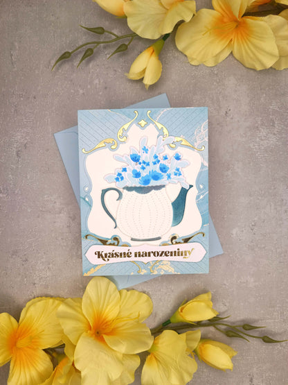 Světle modré narozeninové přání s konvičkou