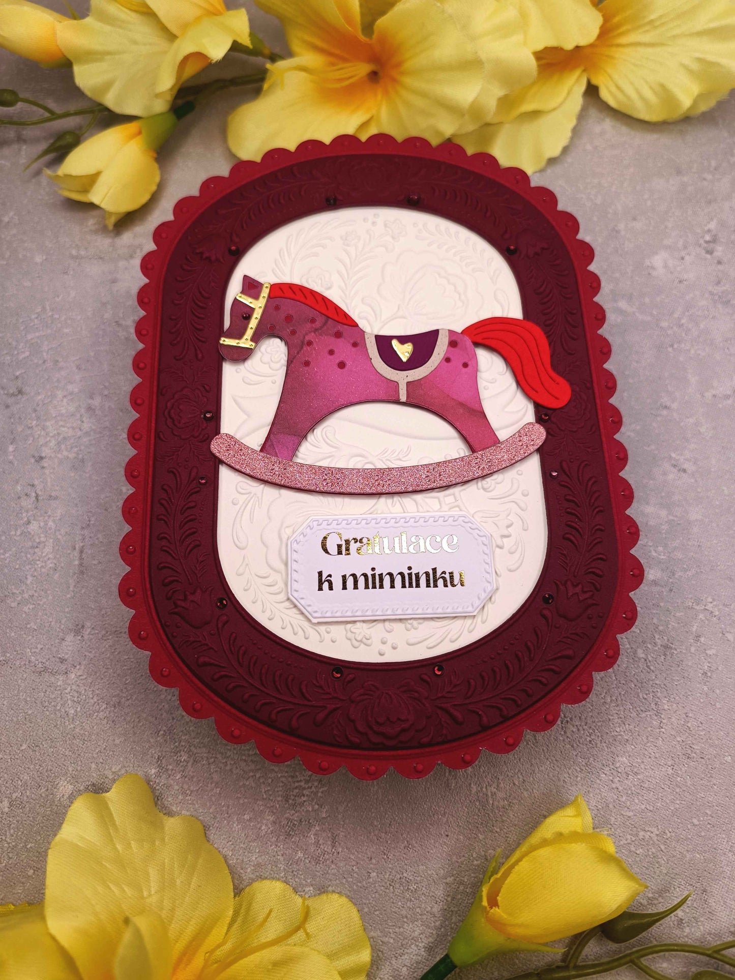 Přání k narození miminka s houpacím koníkem