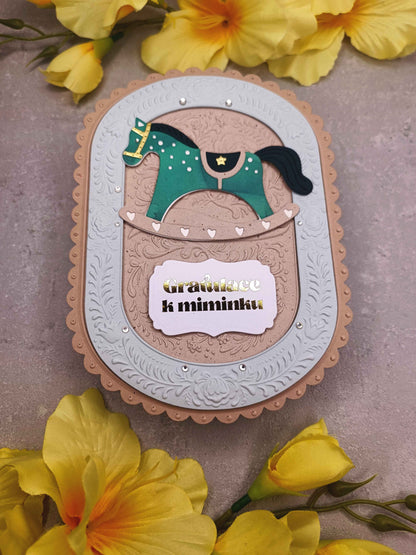 Přání k narození miminka s houpacím koníkem