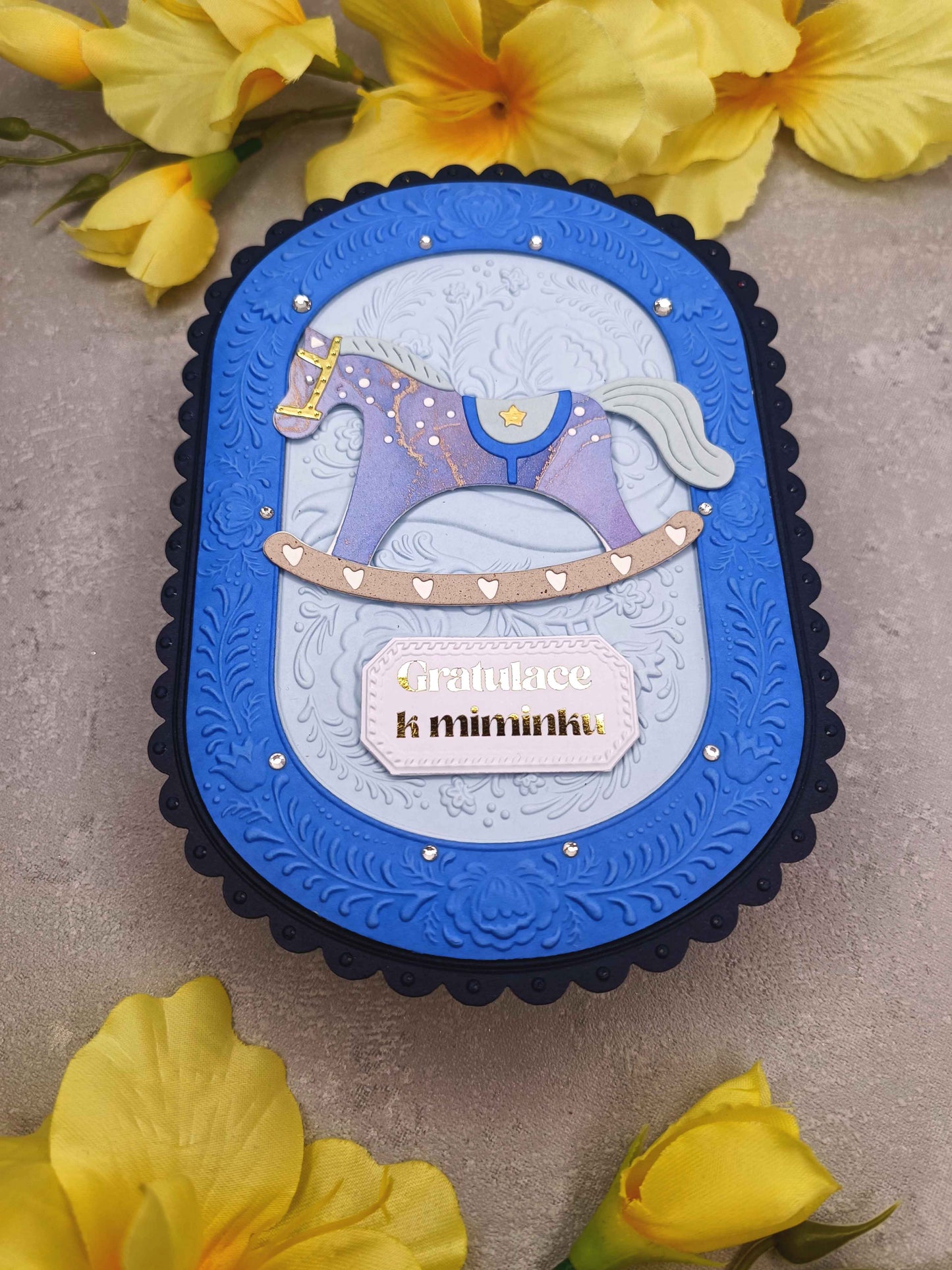 Přání k narození miminka s houpacím koníkem