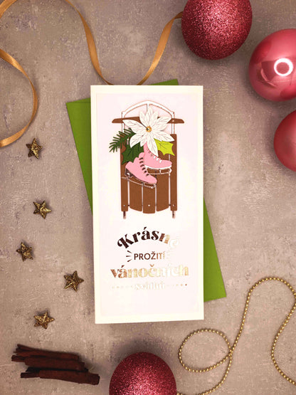 Vánoční přání se sáněmi a bruslemi